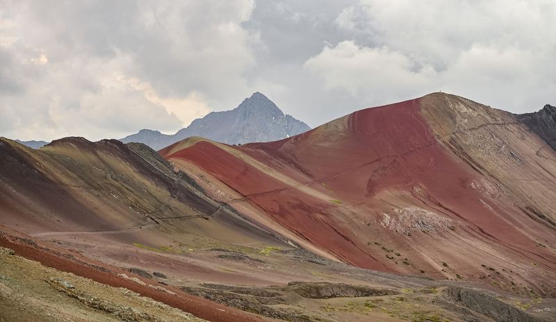 Red and ochre striped slopes of Vinicunca, the Rainbow Mountain